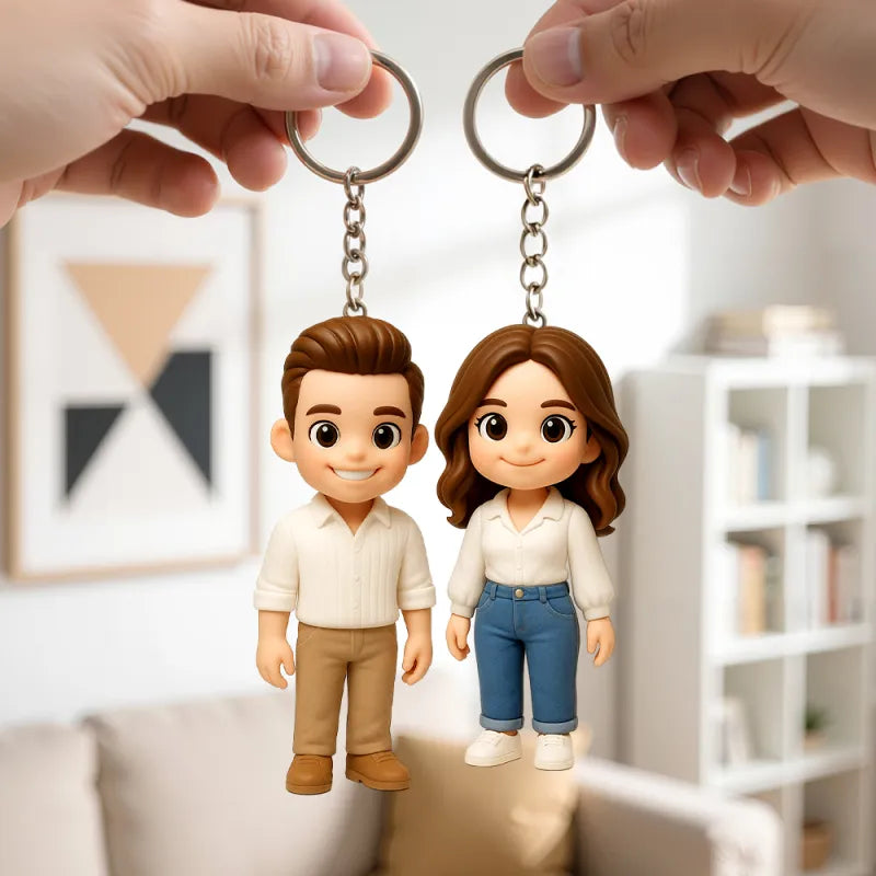 Custom 3D mini figure keychain from MadeMine featuring a personalized doll based on a photo, attached to a metal keyring.