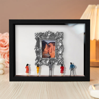 Miniature personalized couple's gift by MadeMine featuring a black frame with spotlights, inspired by Museum of Us design.