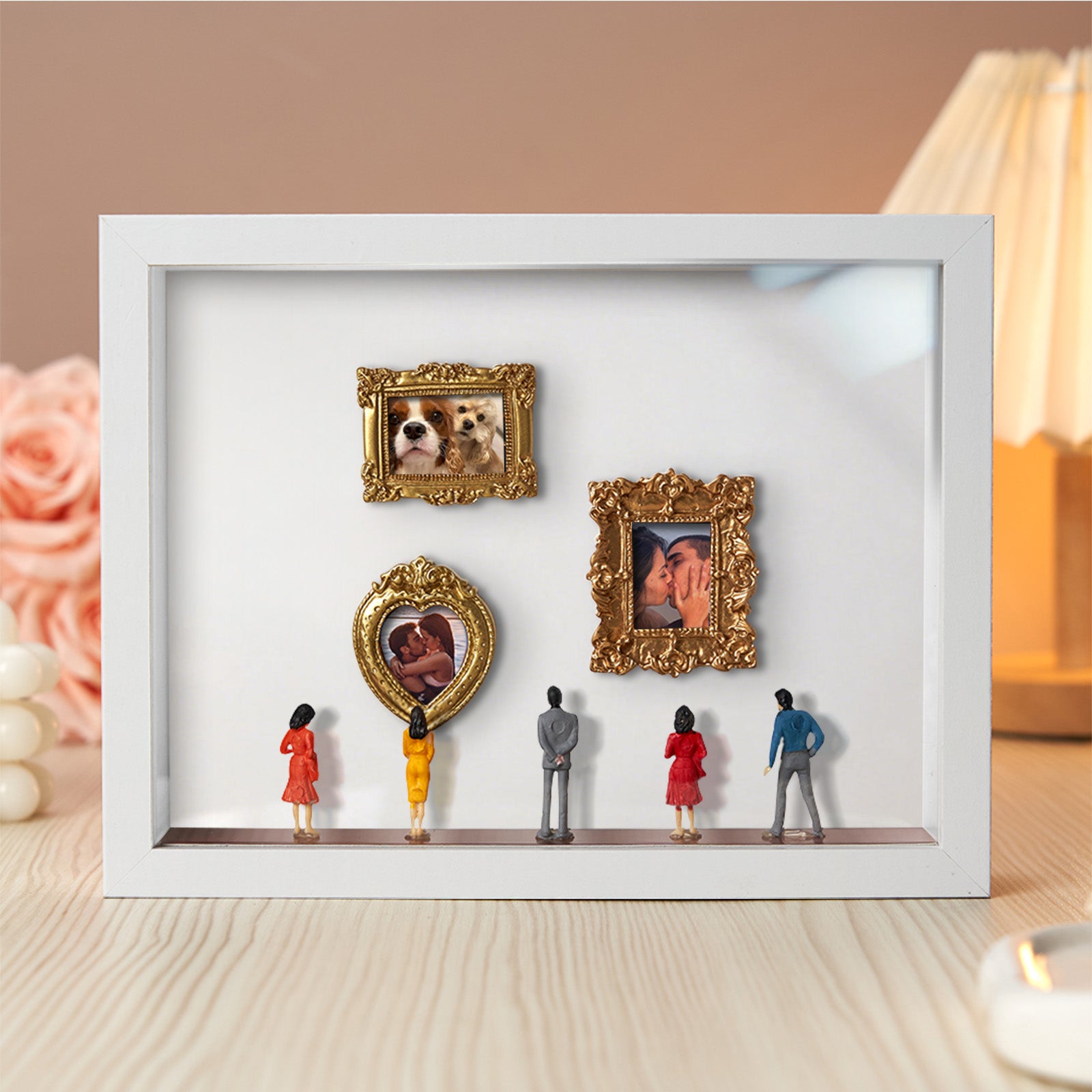 Miniature personalized Museum of Us gift with white frame and spotlights, featuring a cute couple design, by MadeMine.