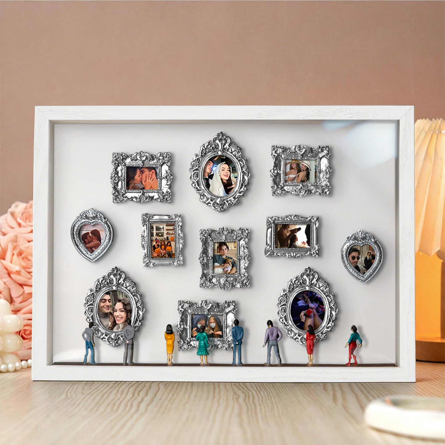 Miniature personalized Museum of Us gift with white frame and spotlights, featuring a cute couple design from MadeMine.