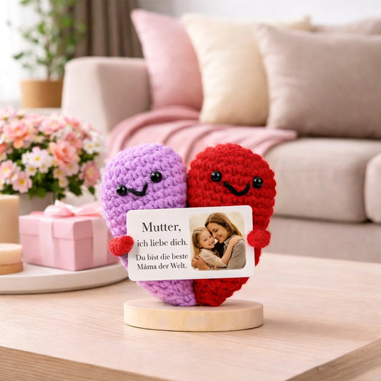 MadeMine custom heart-shaped knitted ornament for Mother's Day with intricate stitching and soft pastel colors.